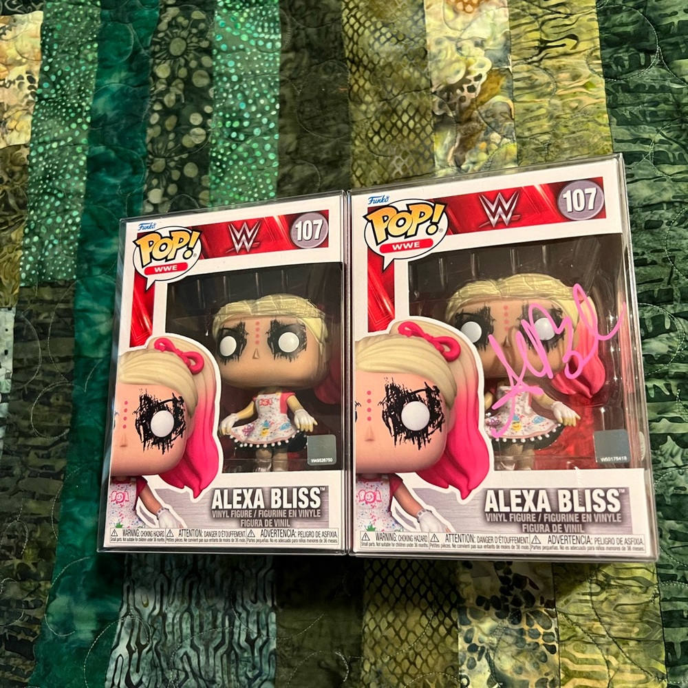Alexa Bliss 107 Pair, one signed. Funko Pop. WWE. JSA authentication.